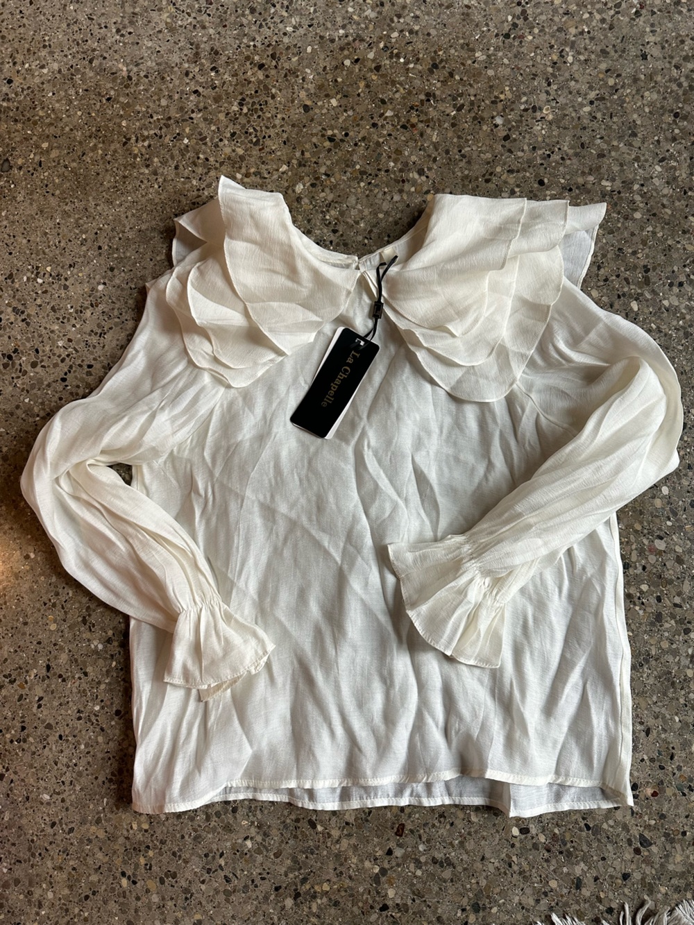 dramatic ruffle collar cream long sleeve blouse